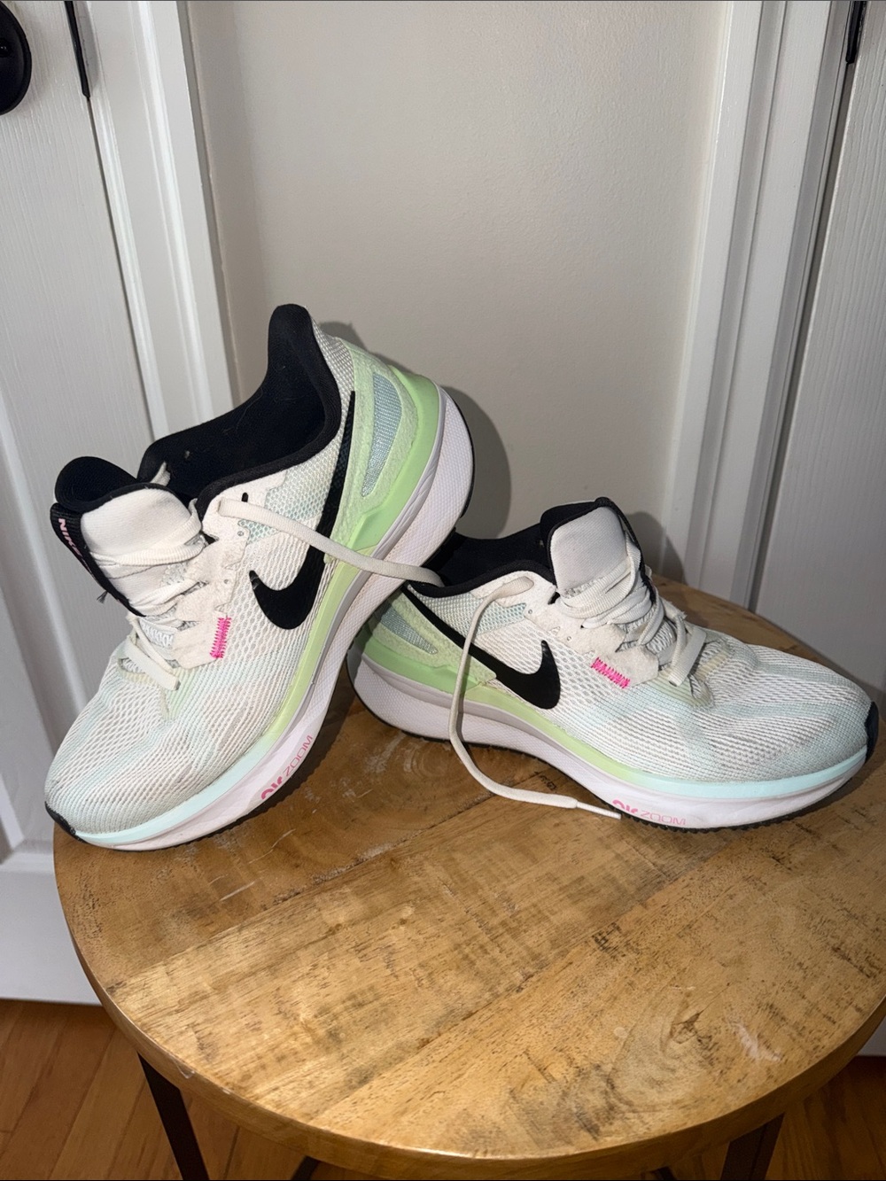 Nike Women's White Running Shoes with Black Swoosh and Mint Accents